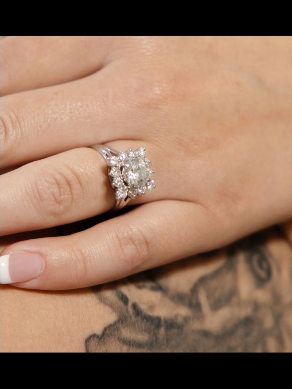 Lady's 14K white gold diamond cluster ring with square design element